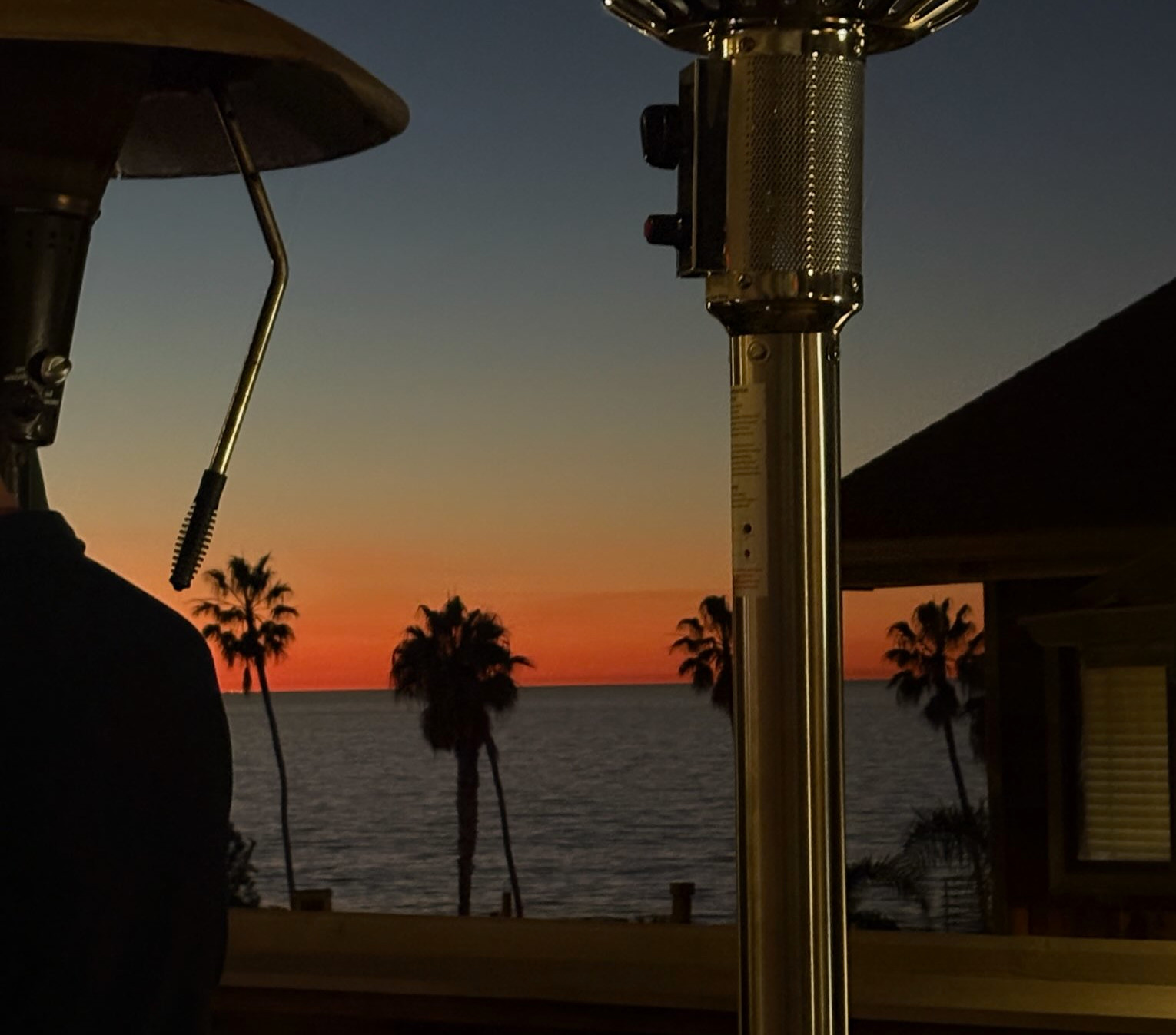 the sunset over la jolla from a wine bar
